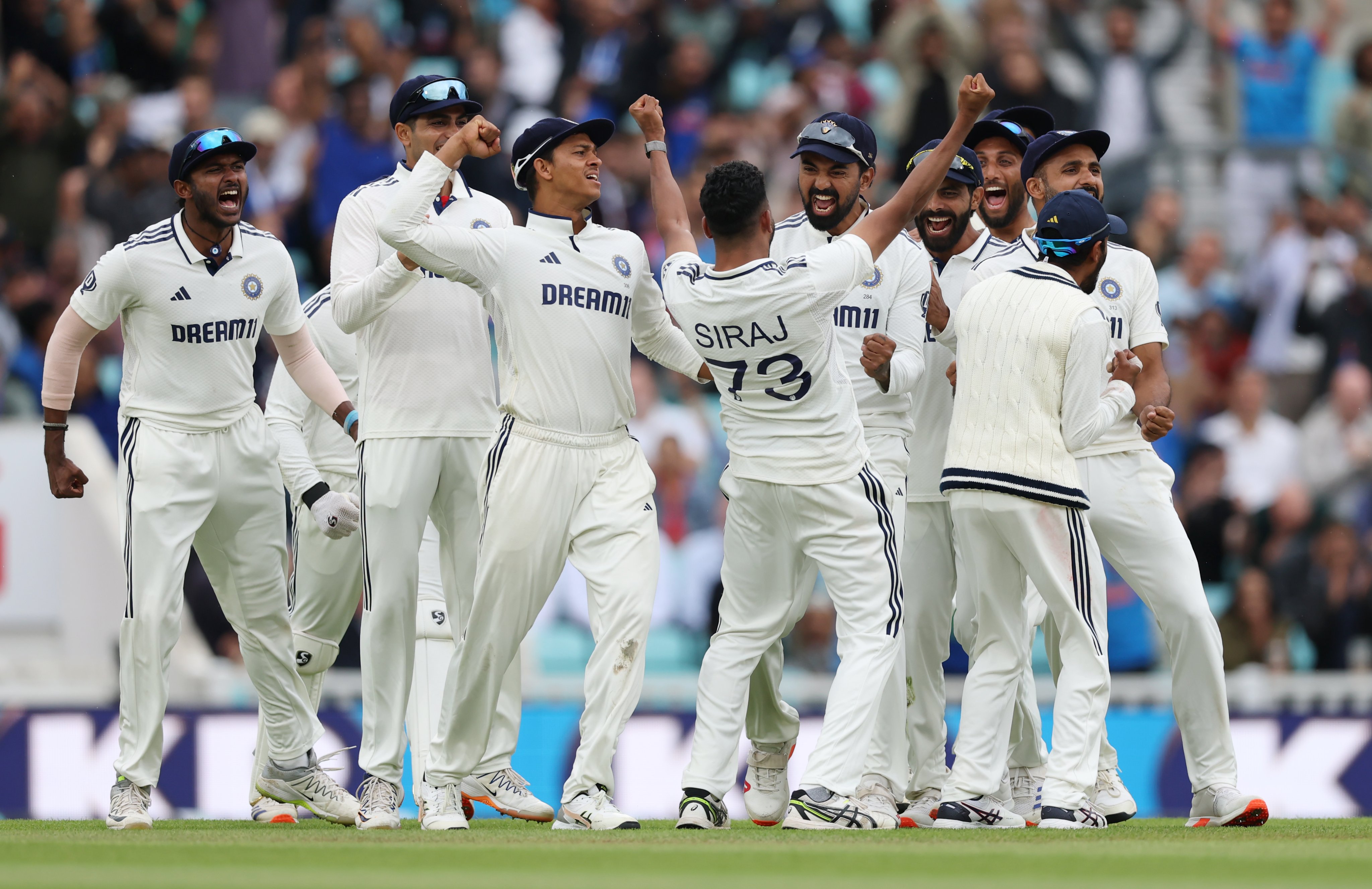 The Indian team celebrate after winning the fifth Test against England at The Oval