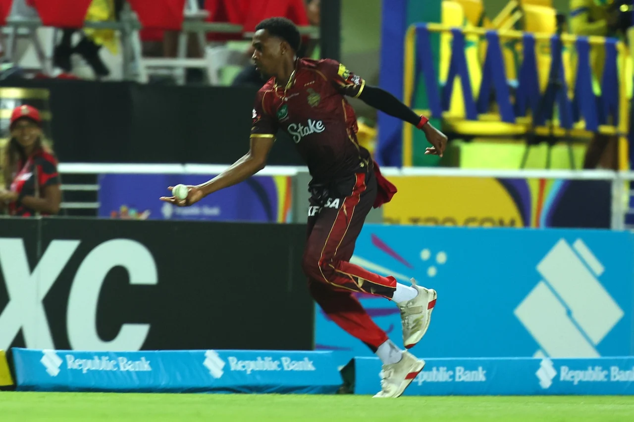 McKenny Clarke pulls out a stunning one-handed catch to dismiss Jewel Andrew 